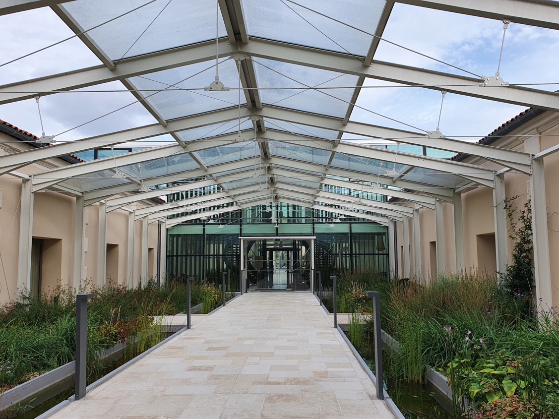 Chais Monnet Passage to Pool and Restaurants